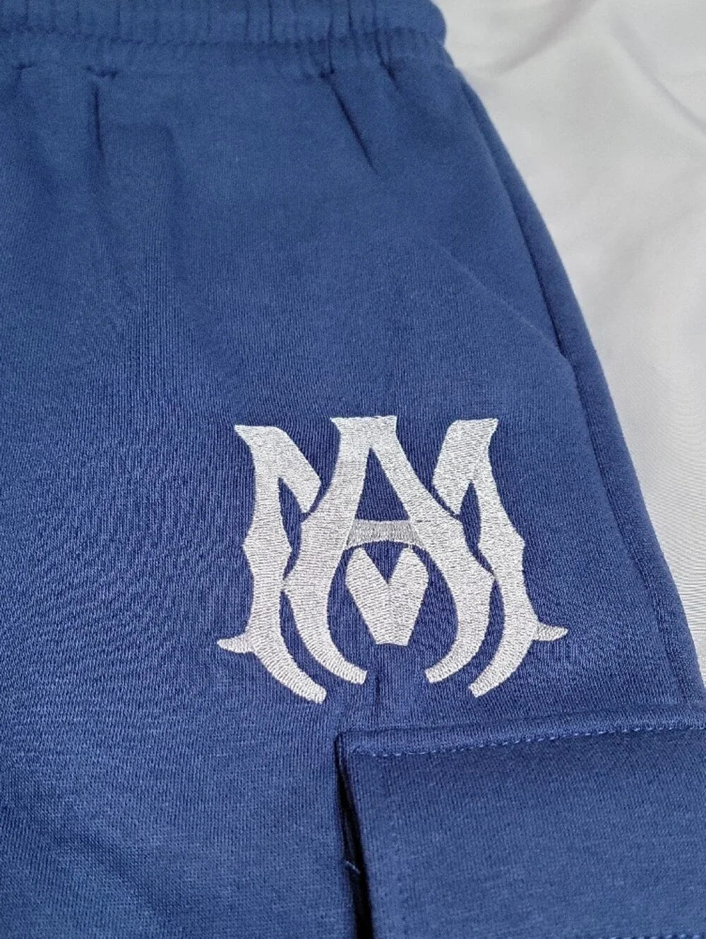 AMIRI Navy Blue Cargo Drawstring Shorts with White Logo